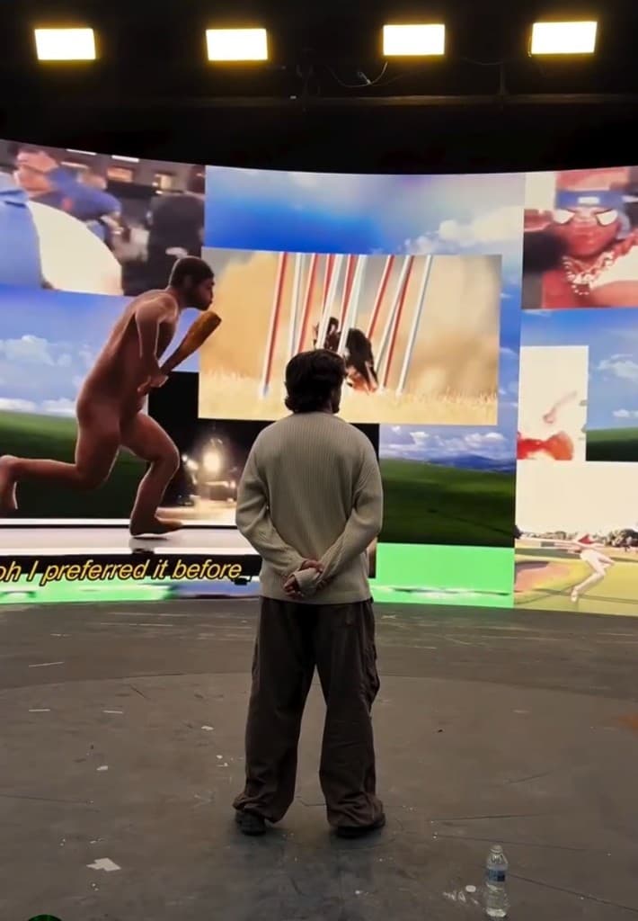 Sergi in the studio, facing a curved display